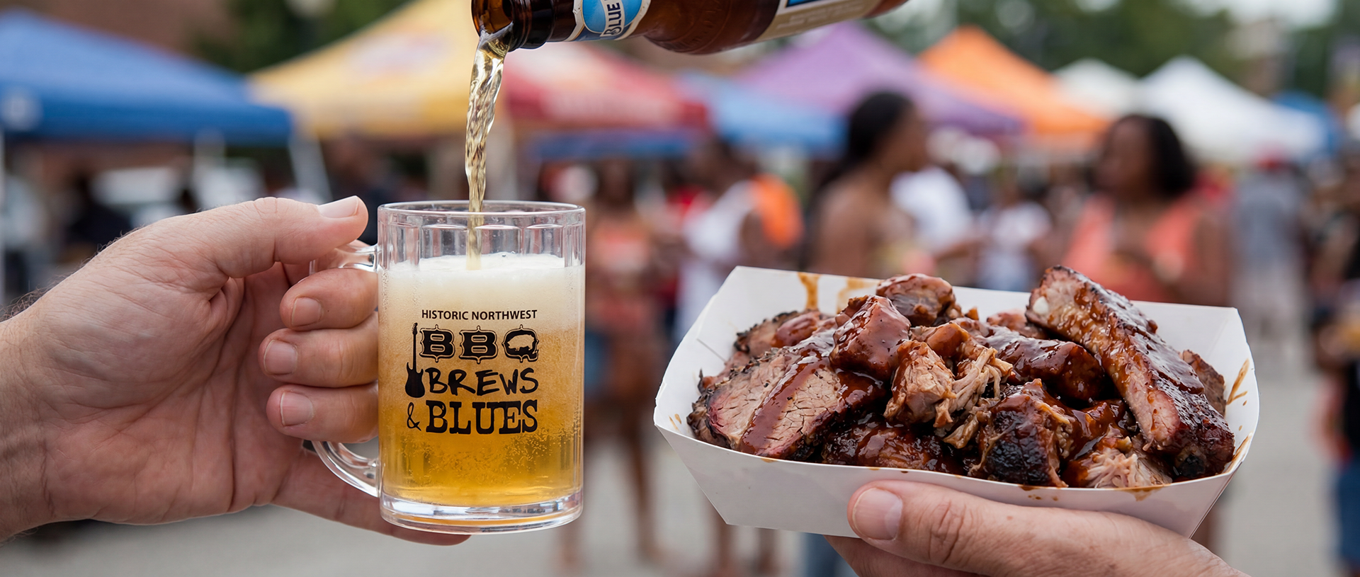 BBQ Brews & Blues logo on mug of cold beer with large serving of barbecue.