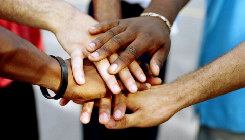 Many hands together.jpeg