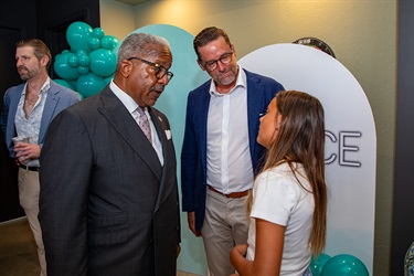 Mayor-Keith-A.-James-takes-a-moment-to-anwser-questions-from-a-young-lady-as-Jeff-Burns-looks-on-a.jpg