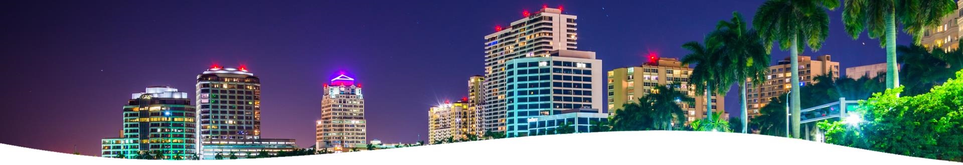 Image of West Palm Beach city skyline at night.