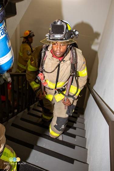 A firefighter begins the climb simulating the 110 stories of the World Trade Center