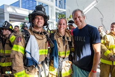 Three West Palm Beach firefighters are ready to begin the climb