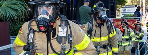 Firefighters wearing breathing masks