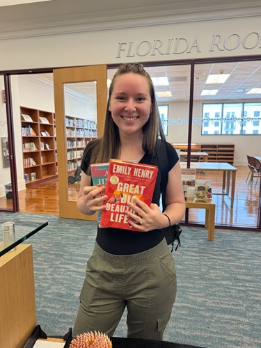 Woman holding books