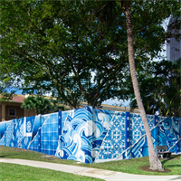 depiction of undulating waves and winds that have shaped the city’s coastal identity
