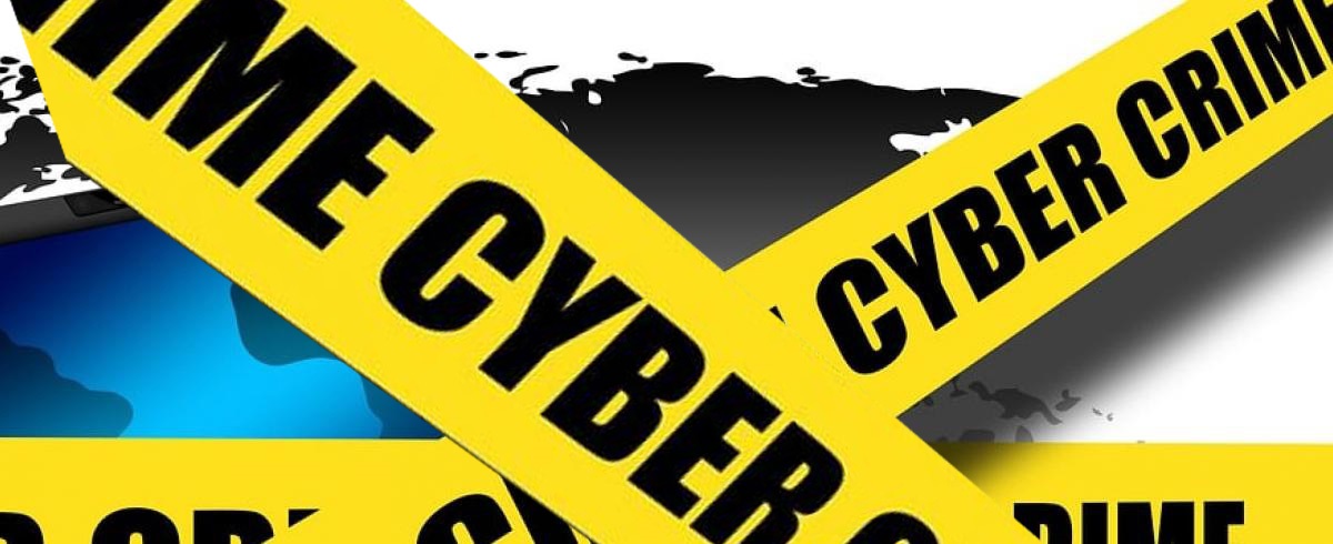 Cybercrime, two yellow banners with cyber crime across them.