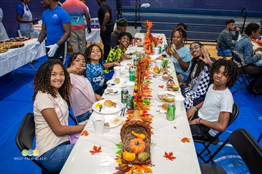 Large gathering at a long table