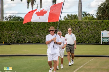 Team Canada - three members marching in