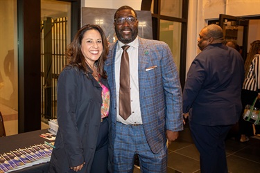 City Commissioner Christina Lambert at VIP reception with official from Battle of the Bands.