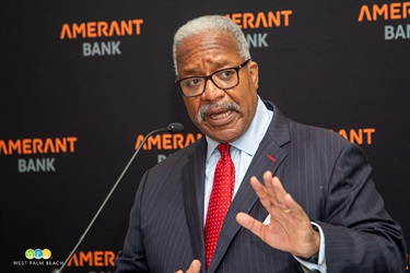Mayor Keith A. James makes a point about the importance of banking in WPB