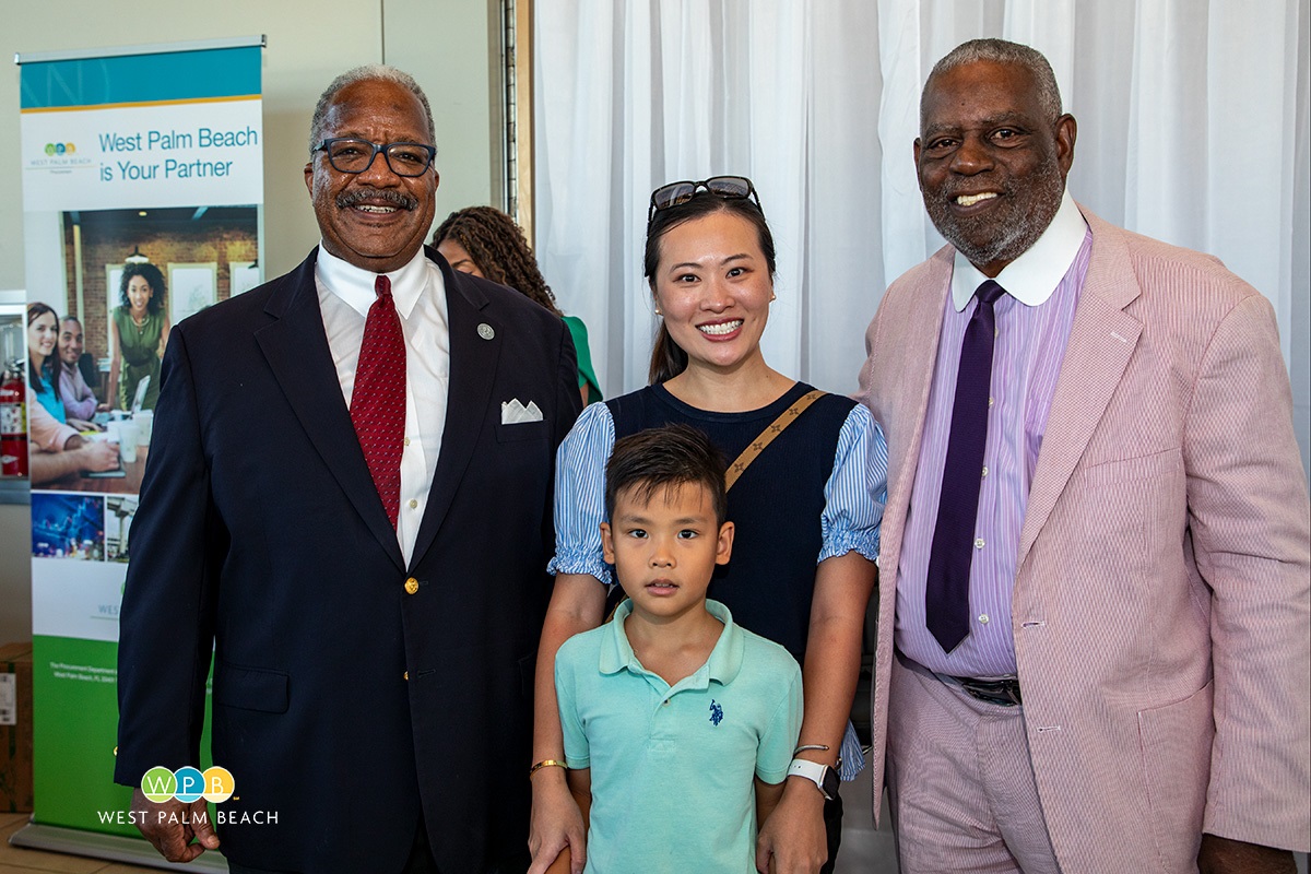 Mayor Keith A. James left greets family with Frank Hayden right