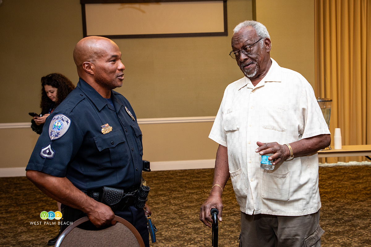 Corporal Rodney Archer chats with a resident