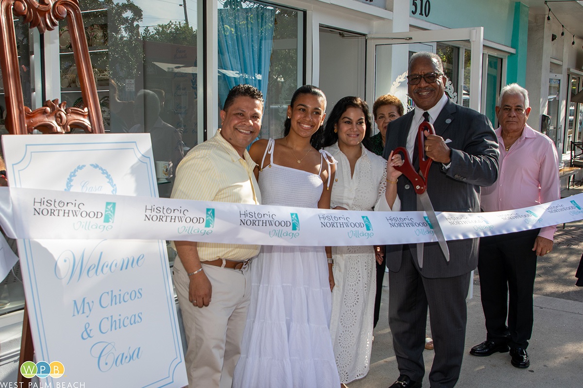 Mayor Keith A. James, holding scissors, cuts the ribbon with, from left, Carlos Cabrera, Cristalee Gacia, owner Lisette Abreu Cabrera , Maria Garcia and Rafael Abreu