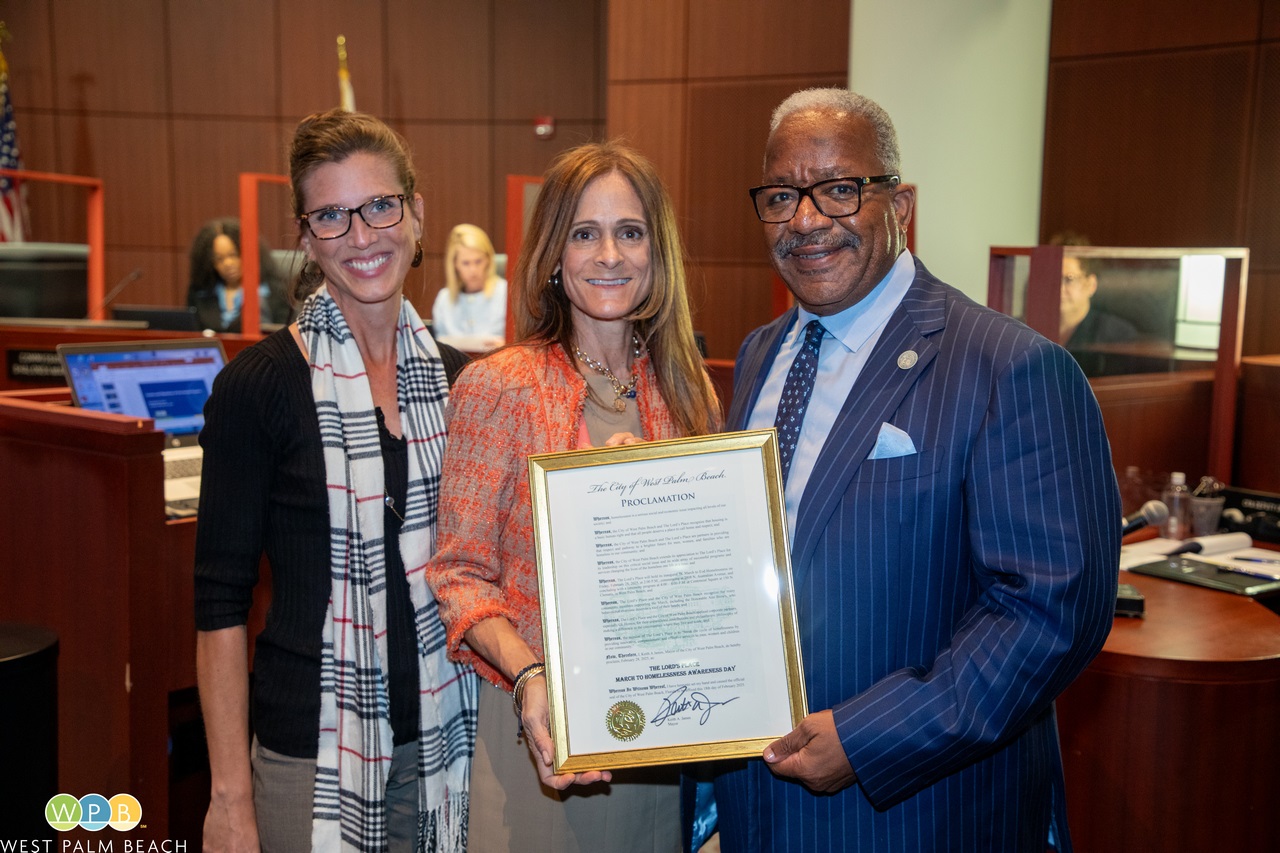 Lord's Place Proclamation, from left, Officer Anne Noble, Kerry Diaz, Lord's Place CEO, and Mayor Keith A. James. 